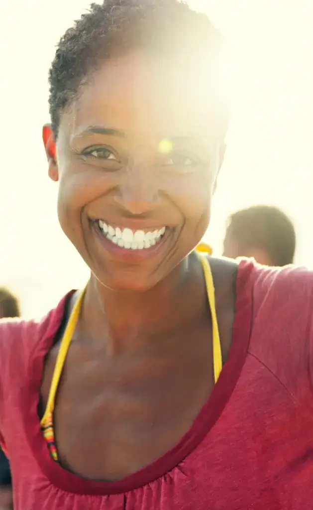 woman looking at camera smiling